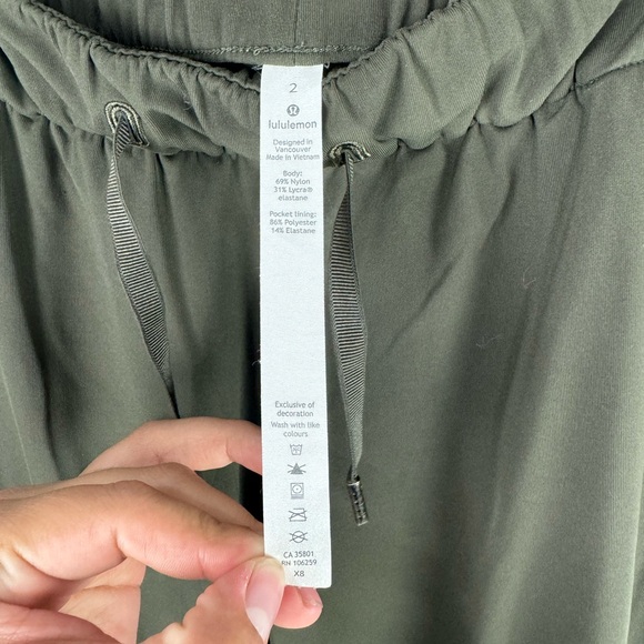 Lululemon On the Fly 7/8 Pant Woven Dark Olive Size 2 - Picture 5 of 8